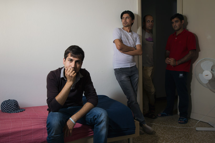 Nuovi vicini onlus caritas foto portrait rifugiati Alessandro Venier